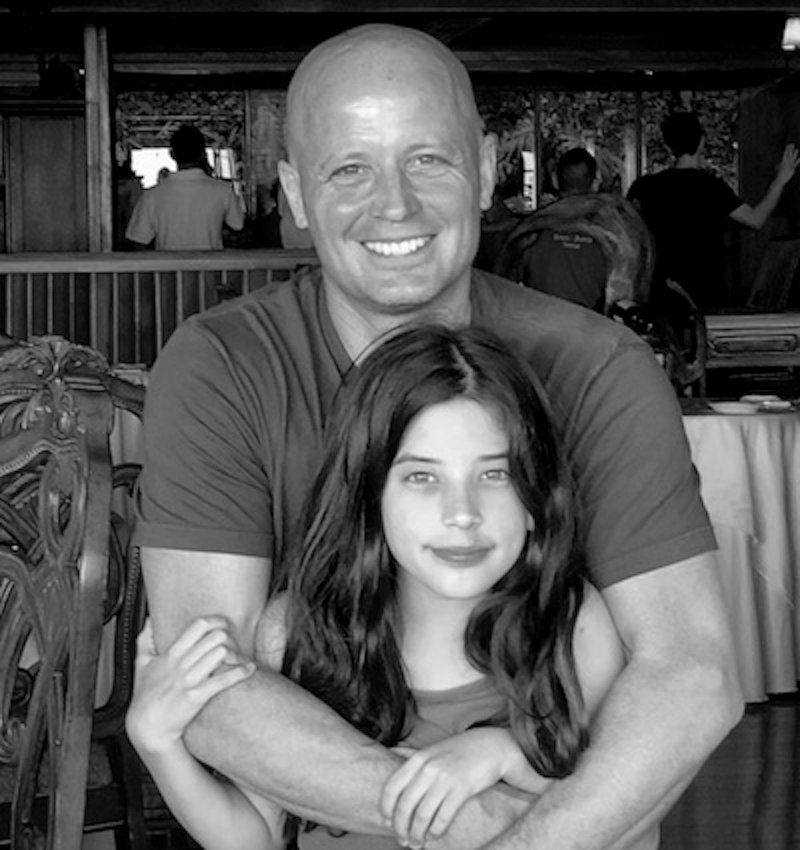 Tomas Anthony with his daughter